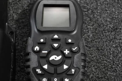 Slide: The Image of 2024 Triton 186 Allure boat interior with steering wheel and dashboard controls. - 44