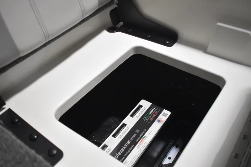 Slide: The Image of Storage compartment in 2024 Triton 186 Allure boat with battery inside. - 69