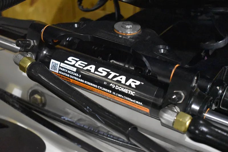 Slide: The Image of 2024 Triton 186 Allure featuring SeaStar outboard steering cylinder by Dometic. - 72