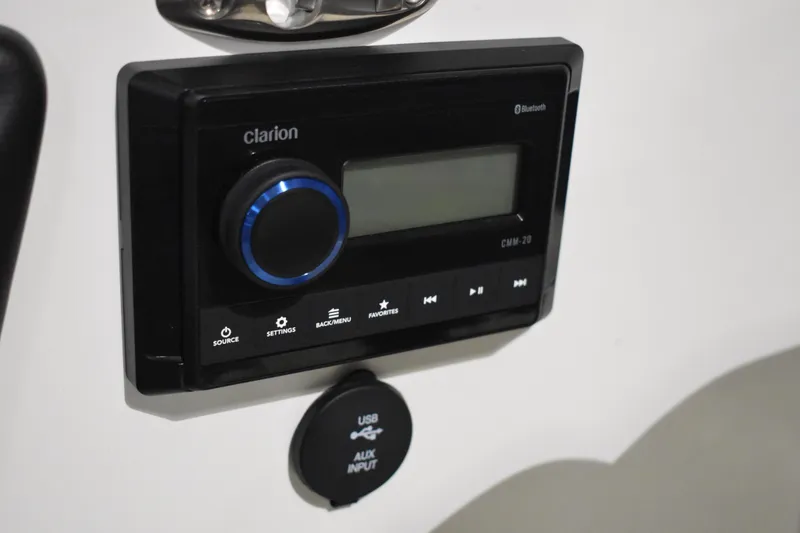 Slide: The Image of 2024 Triton 186 Allure boat audio system with Clarion CMM-20 and USB/AUX input. - 73