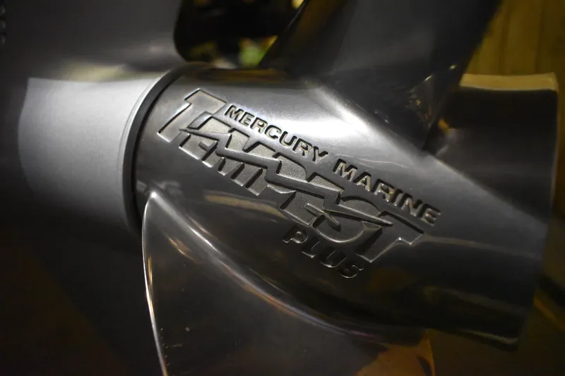Slide: The Image of Close-up of Mercury Marine Tempest Plus propeller on 2024 Triton 186 Allure boat. - 77