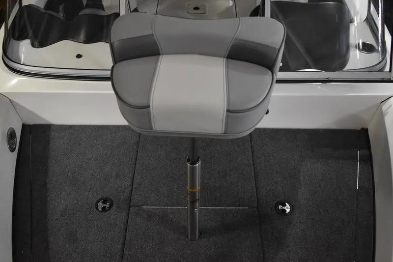 Slide: The Image of 2024 Triton 186 Allure boat seat on carpeted deck. - 93