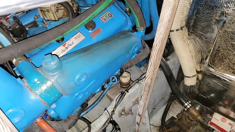 Slide: The Image of Engine compartment of a 1983 Bertram 33 Flybridge Cruiser with Crusader Model 350 engine. - 31
