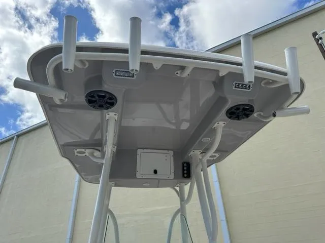 Slide: The Image of 2022 Sea Born 22 LX T-top with rod holders and speakers. - 3