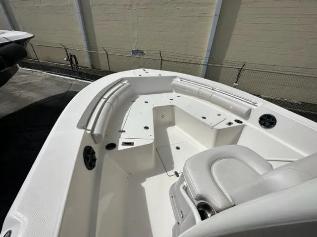 Slide: The Image of 2022 Sea Born 22 LX boat interior with seating and storage compartments. - 5