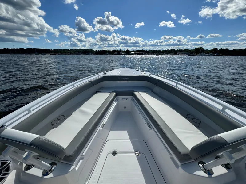 Slide: The Image of 2024 Everglades 273 Center Console boat on a sunny day. - 18