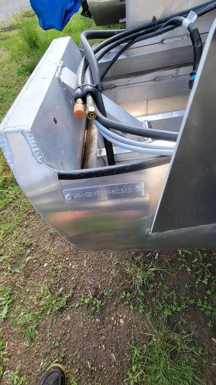 Slide: The Image of 2023 Godfrey Sweetwater 2086 BF GTP 27 in. Center Tube, close-up of boat's rear section. - 11