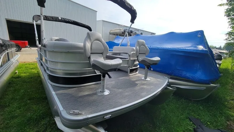 Slide: The Image of 2023 Godfrey Sweetwater 2086 BF GTP pontoon boat with center tube, docked outdoors. - 3