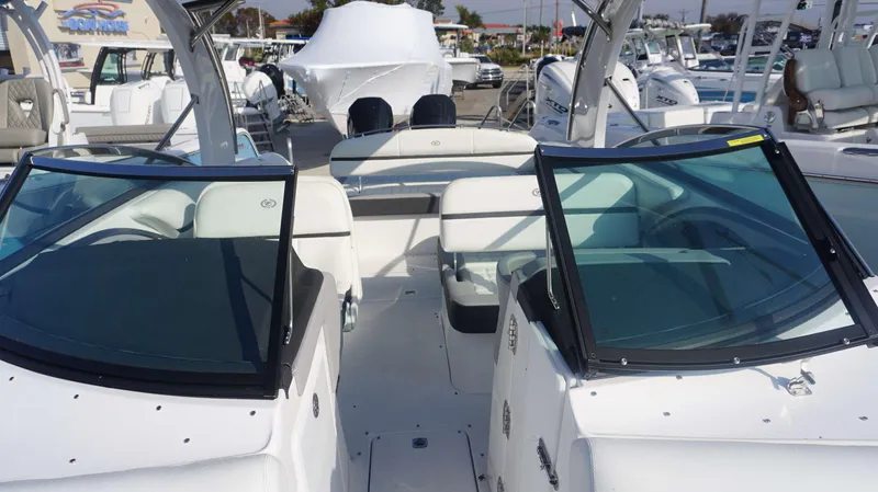 Slide: The Image of 2024 Cobalt 30 SC boat interior with modern seating and sleek design. - 5