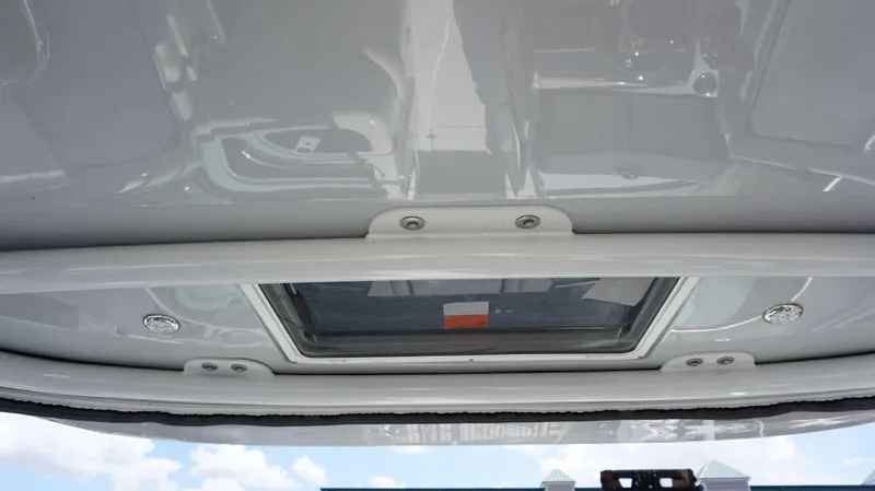 Slide: The Image of 2024 Crownline 280 DC boat roof hatch and ceiling details. - 20