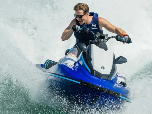 Slide: The Image of 2024 Yamaha Waverunners JetBlaster® in action on the water. - 7