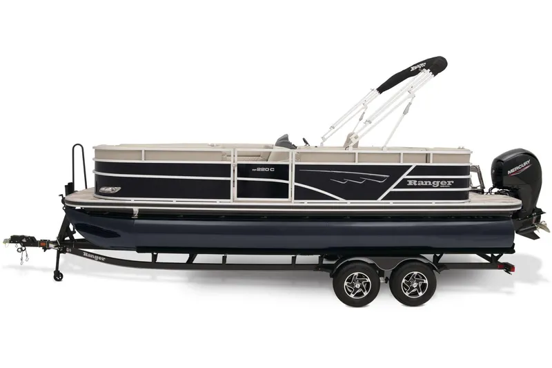 Slide: The Image of 2024 Ranger Reata 220C boat storage compartment with wiring and quilted seat cushion. - 5