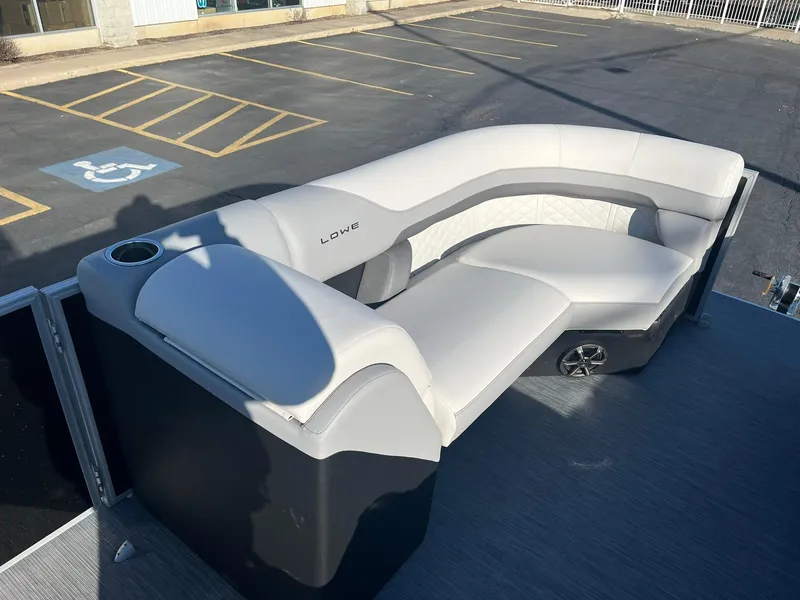 Slide: The Image of 2024 Lowe SS 210 WT pontoon boat with white and gray seating. - 17