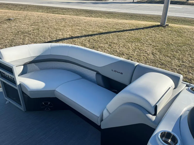 Slide: The Image of 2024 Lowe SS 210 WT pontoon boat with spacious seating area. - 18