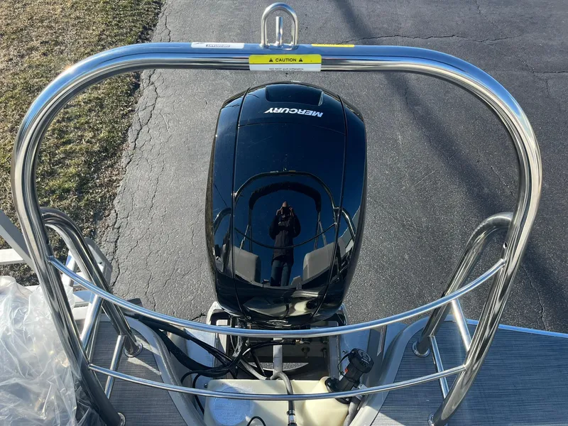 Slide: The Image of 2024 Lowe SS 210 WT boat with Mercury outboard motor, rear view. - 19