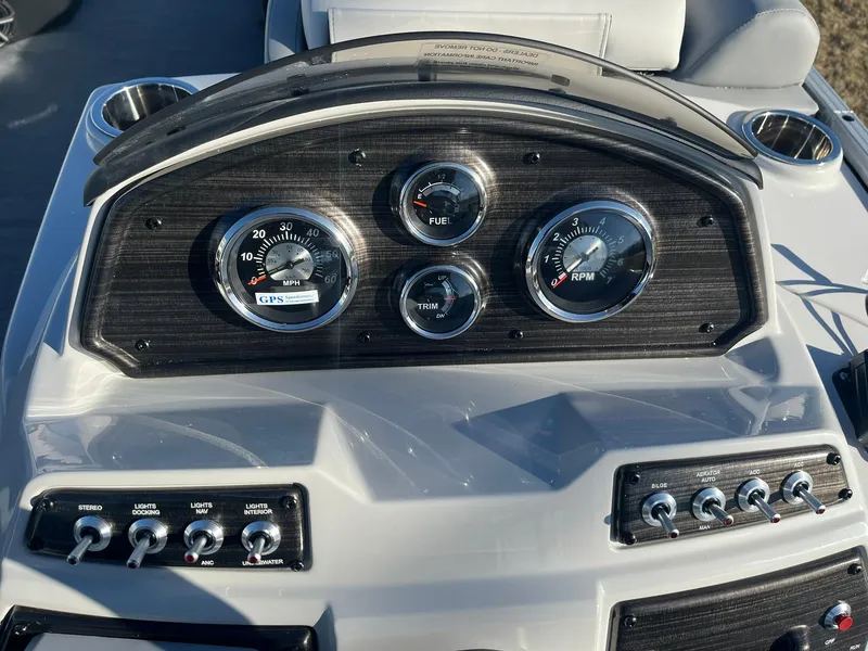 Slide: The Image of Dashboard of 2024 Lowe SS 210 WT boat with gauges and controls. - 8
