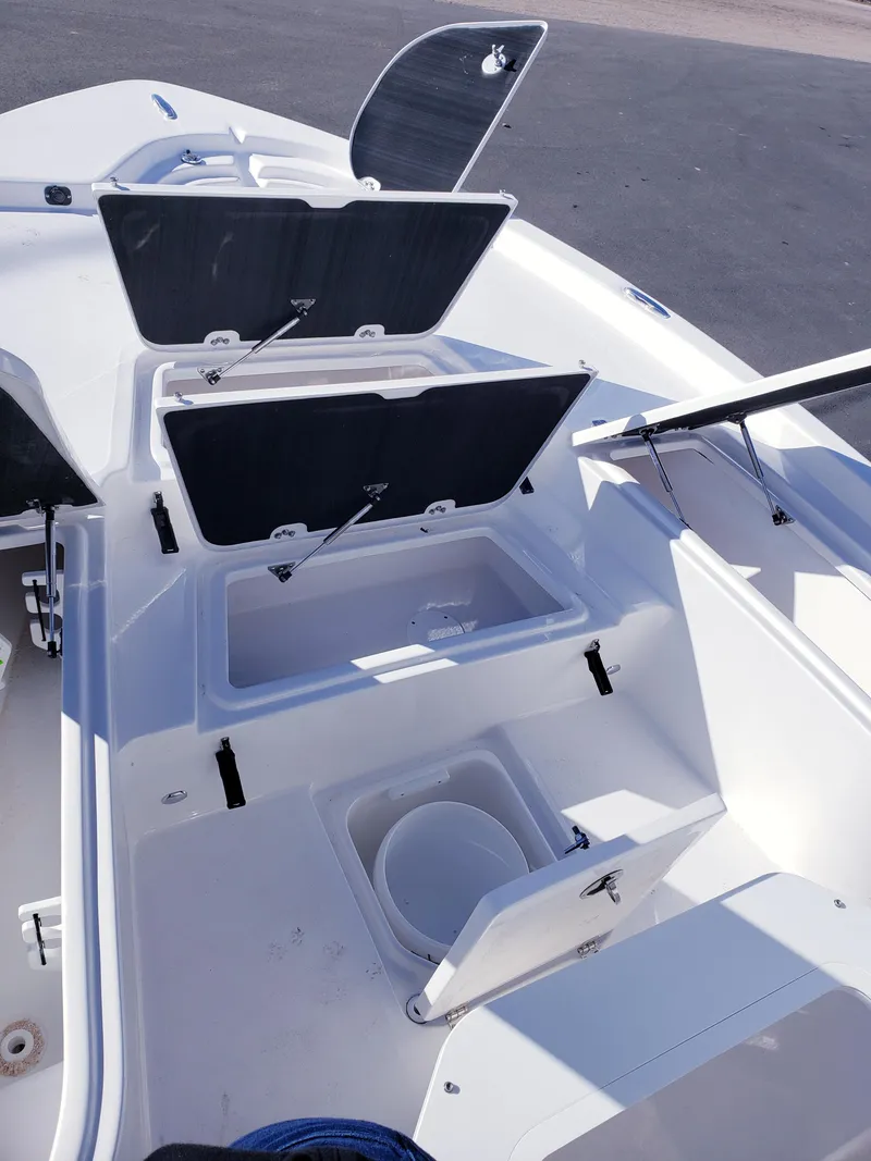 Slide: The Image of 2024 Sea Fox 231 Bay Fox boat storage compartments and livewell. - 16