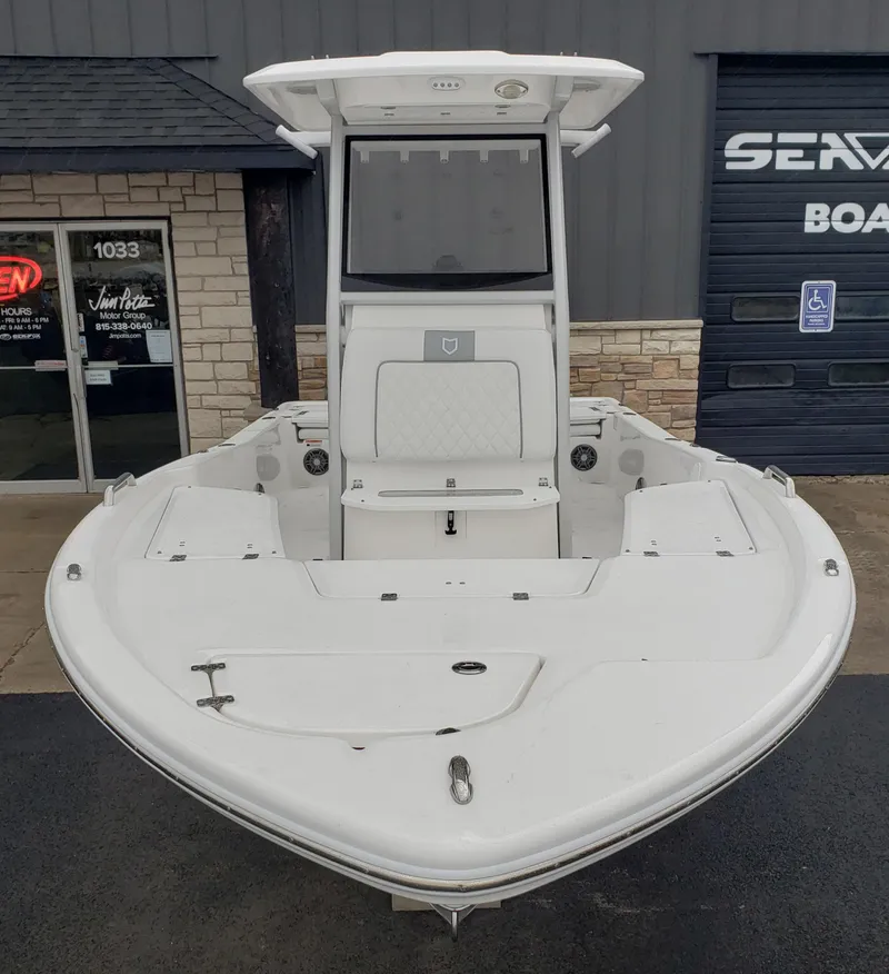 Slide: The Image of 2024 Sea Fox 231 Bay Fox boat front view at dealership. - 6
