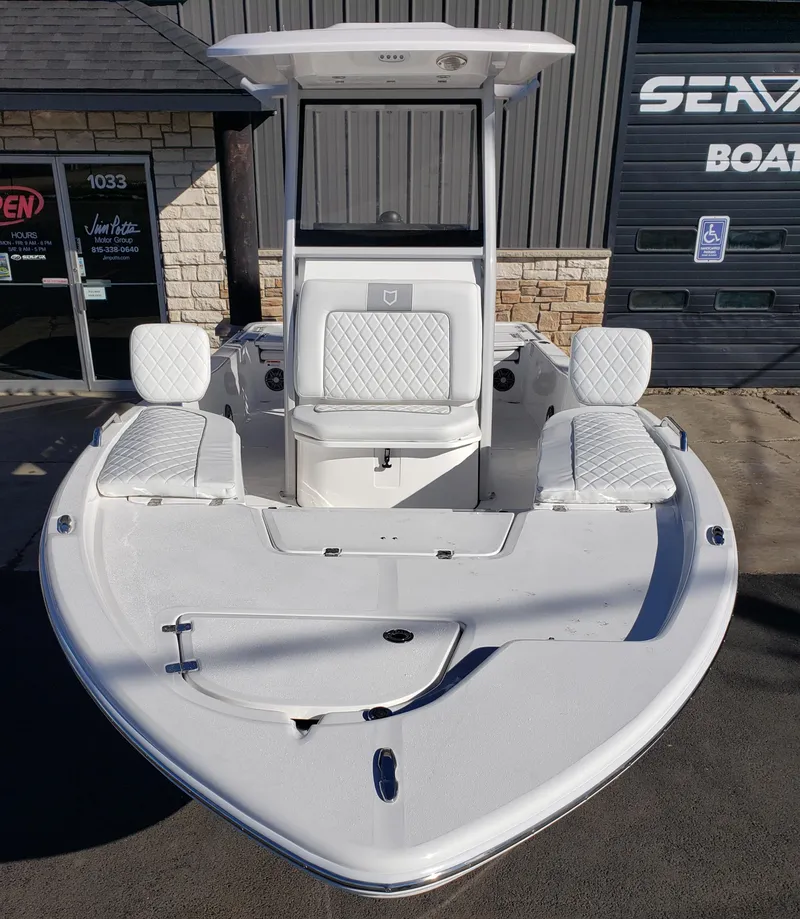 Slide: The Image of 2024 Sea Fox 231 Bay Fox boat with white seating and T-top. - 7
