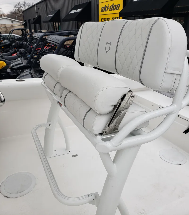 Slide: The Image of 2024 Sea Fox 248 Side Console boat with white cushioned seating. - 10