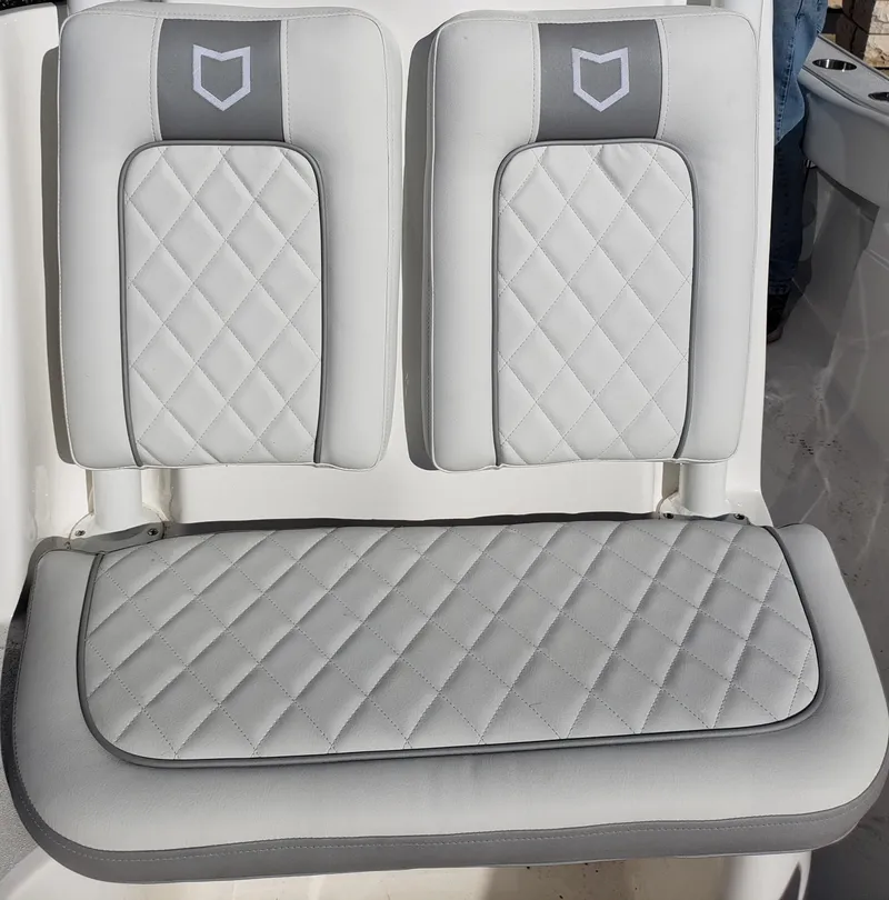 Slide: The Image of 2024 Sea Fox 248 Side Console boat seat with diamond-stitched upholstery. - 11