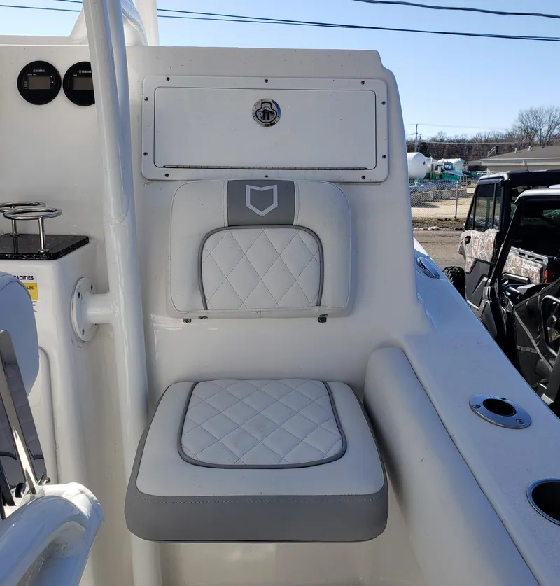 Slide: The Image of 2024 Sea Fox 248 Side Console boat interior seating area. - 13