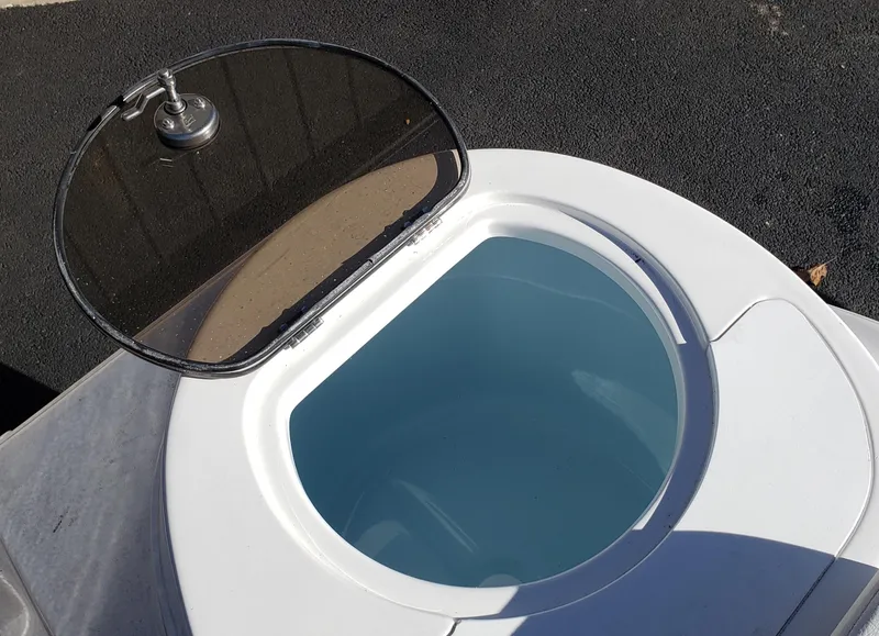 Slide: The Image of Open livewell on a 2024 Sea Fox 248 Side Console boat. - 15