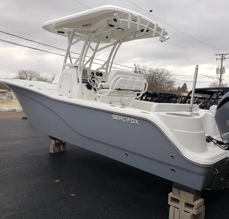 Slide: The Image of 2024 Sea Fox 248 Side Console boat on display. - 2