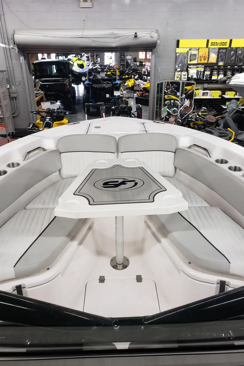 Slide: The Image of 2023 Sea Fox 228 Commander boat interior with seating and table. - 10