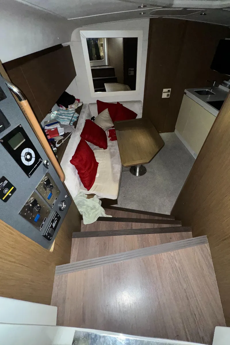 Slide: The Image of Interior of 2018 Beneteau 40 Gran Tourismo with cozy seating and modern amenities. - 18