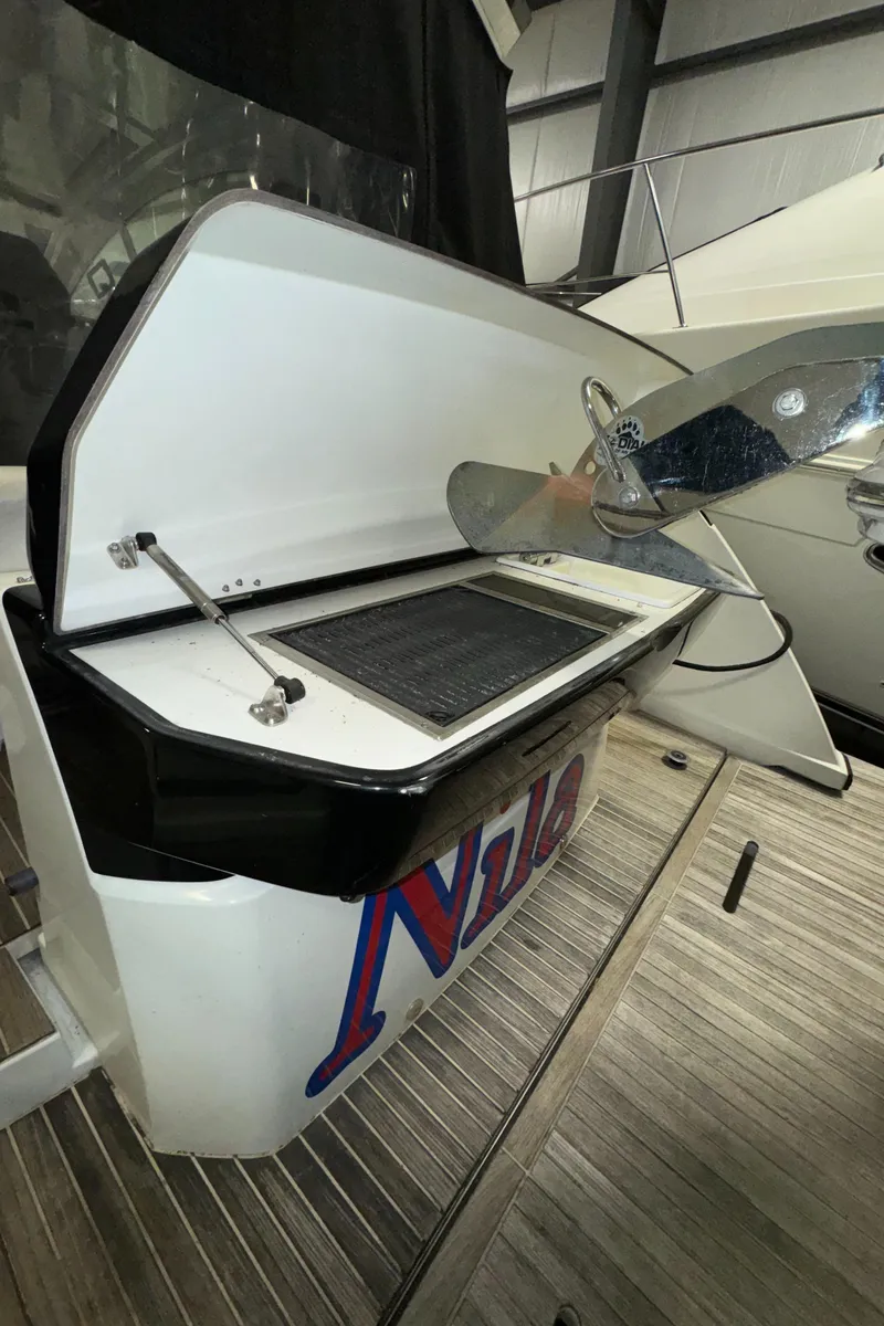 Slide: The Image of 2018 Beneteau 40 Gran Tourismo yacht with open storage compartment. - 7