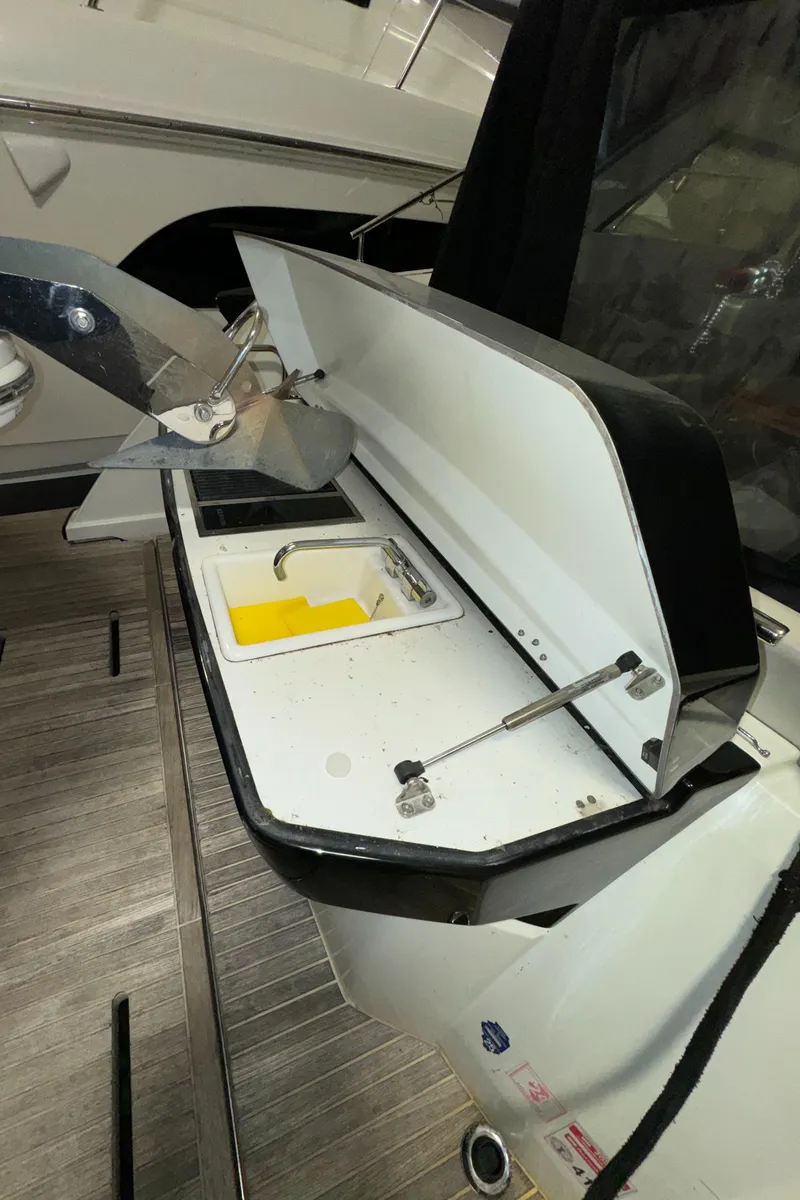 Slide: The Image of 2018 Beneteau 40 Gran Tourismo yacht with open storage compartment. - 8