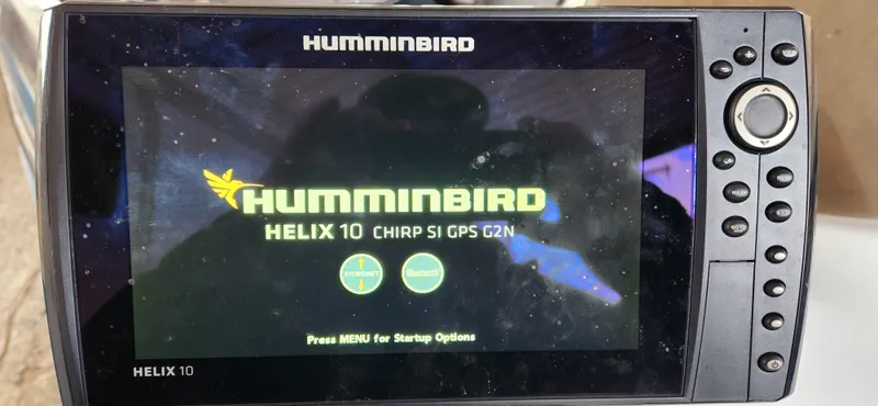 Slide: The Image of Humminbird Helix 10 CHIRP SI GPS G2N fish finder on a 2005 Ranger 520 VX. - 15