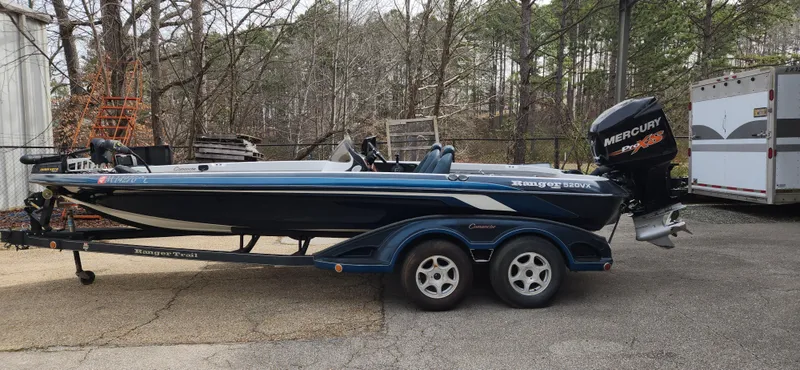Slide: The Image of 2005 Ranger 520 VX bass boat with Mercury outboard motor on trailer. - 5