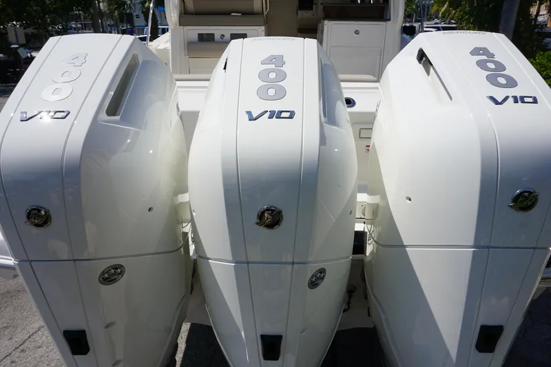 Slide: The Image of Triple 400 V10 engines on a 2025 Boston Whaler 365 Conquest boat. - 13