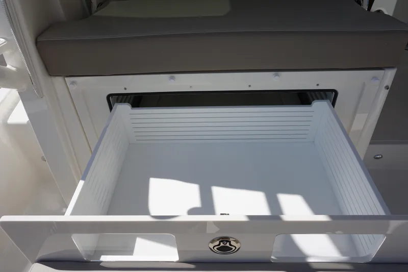 Slide: The Image of Open storage drawer on 2025 Boston Whaler 365 Conquest boat. - 27