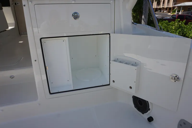 Slide: The Image of Open storage compartment on a 2025 Boston Whaler 365 Conquest boat. - 31