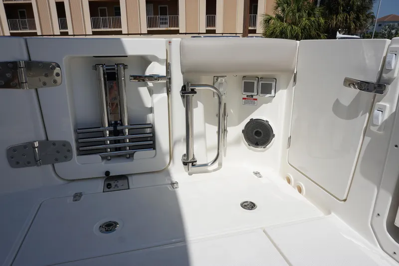 Slide: The Image of 2025 Boston Whaler 365 Conquest boat interior with ladder and speaker. - 33