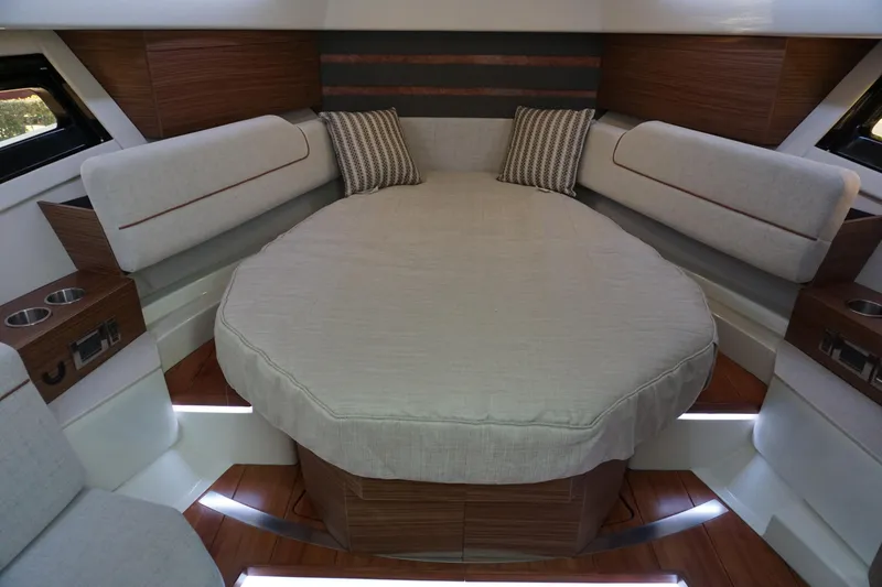 Slide: The Image of 2025 Boston Whaler 365 Conquest cabin with cozy seating and modern design. - 53