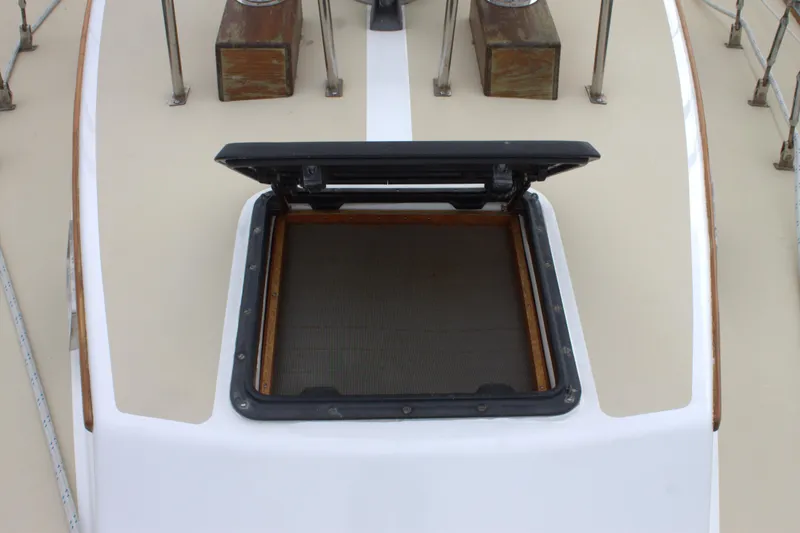 Slide: The Image of Open hatch on 1980 Bristol 35.5 sailboat deck. - 10