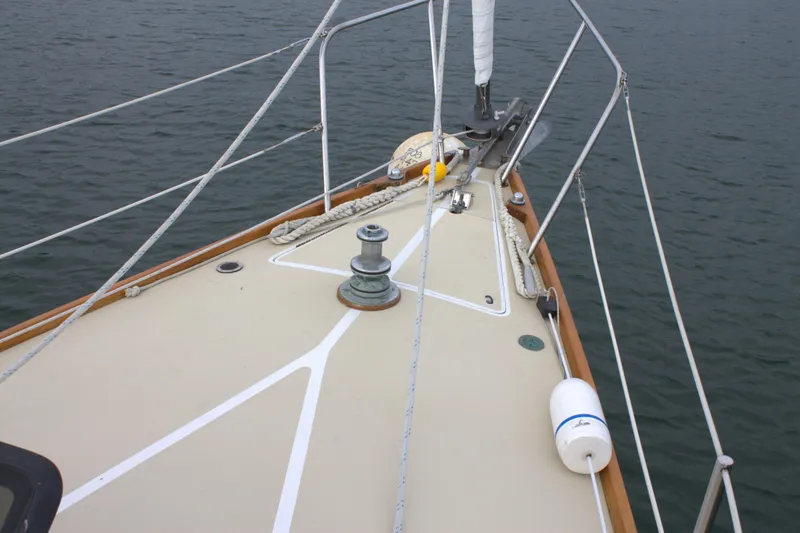 Slide: The Image of Bow of 1980 Bristol 35.5 sailboat on water. - 16