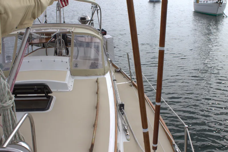 Slide: The Image of 1980 Bristol 35.5 sailboat deck view on calm water. - 17