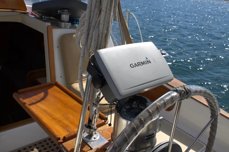 Slide: The Image of Garmin navigation system on a 1980 Bristol 35.5 sailboat's helm. - 2