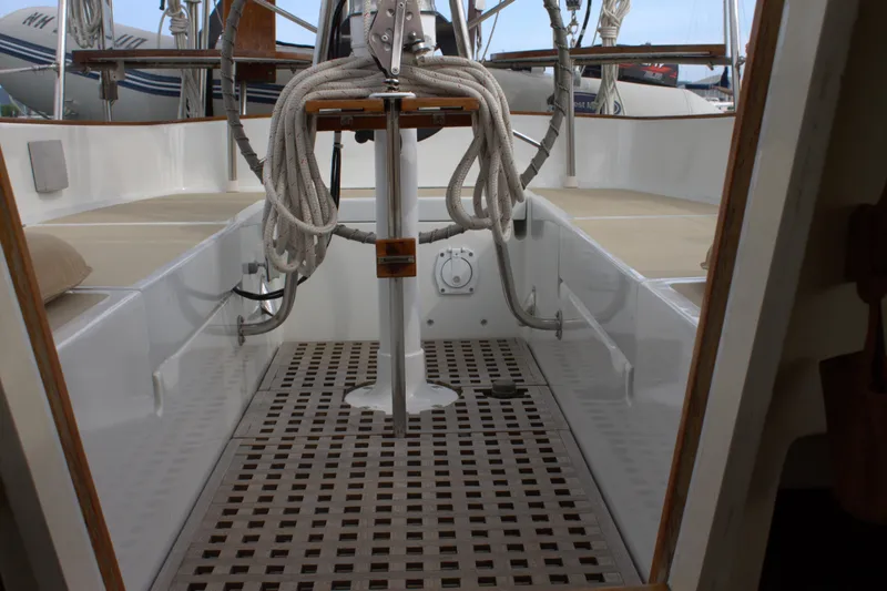 Slide: The Image of 1980 Bristol 35.5 sailboat cockpit with ropes and wooden flooring. - 22