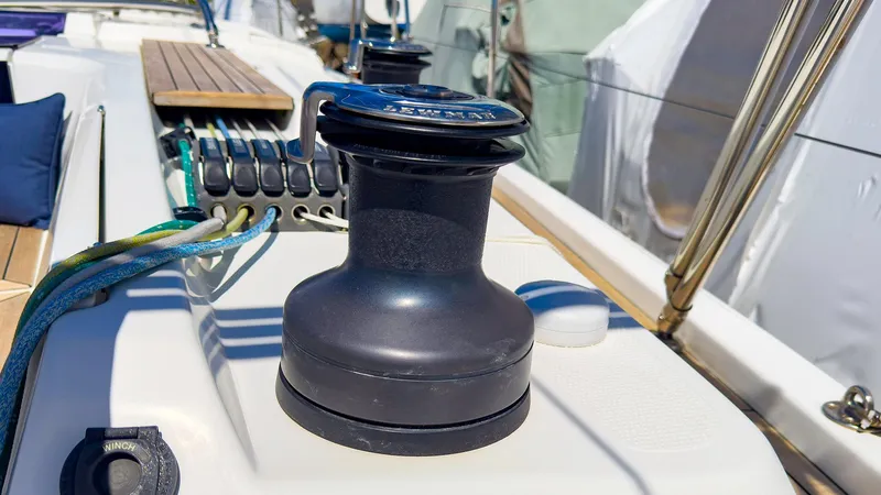 Slide: The Image of Winch and ropes on the deck of a 2014 Hanse 445 sailboat. - 10