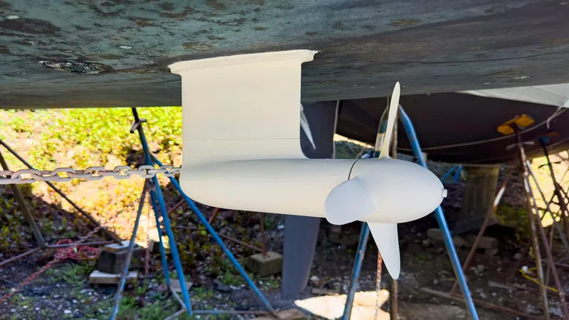 Slide: The Image of Propeller and rudder of a 2014 Hanse 445 sailboat on dry dock. - 17