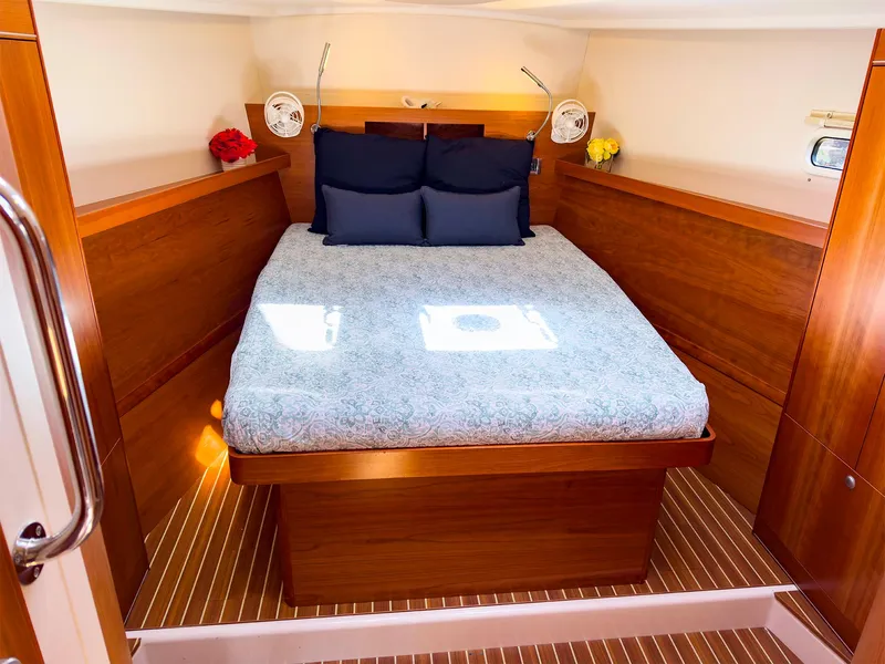 Slide: The Image of 2014 Hanse 445 yacht interior cabin with double bed and wooden finish - 36