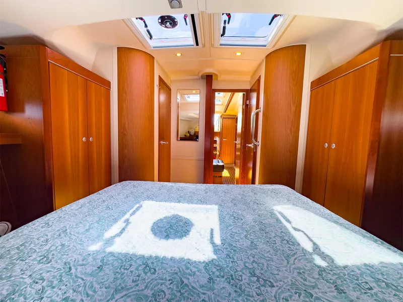 Slide: The Image of Interior cabin of 2014 Hanse 445 yacht with wooden finishes and skylights. - 37