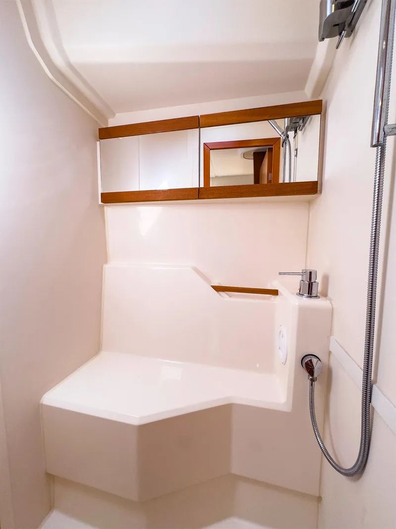 Slide: The Image of Modern bathroom in a 2014 Hanse 445 yacht with a sleek shower area. - 41
