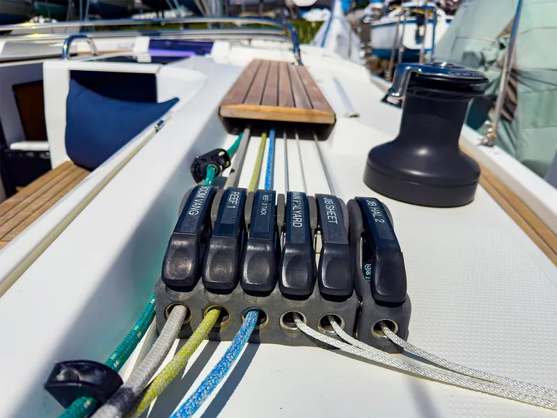 Slide: The Image of Close-up of sailing ropes and winch on a 2014 Hanse 445 yacht. - 8